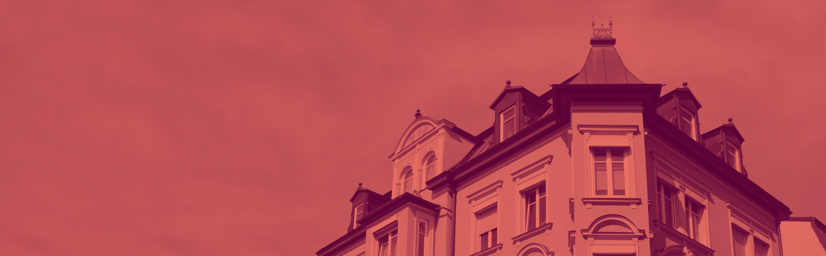 Bild mit einem Haus, das einen Immobilienverkauf andeutet