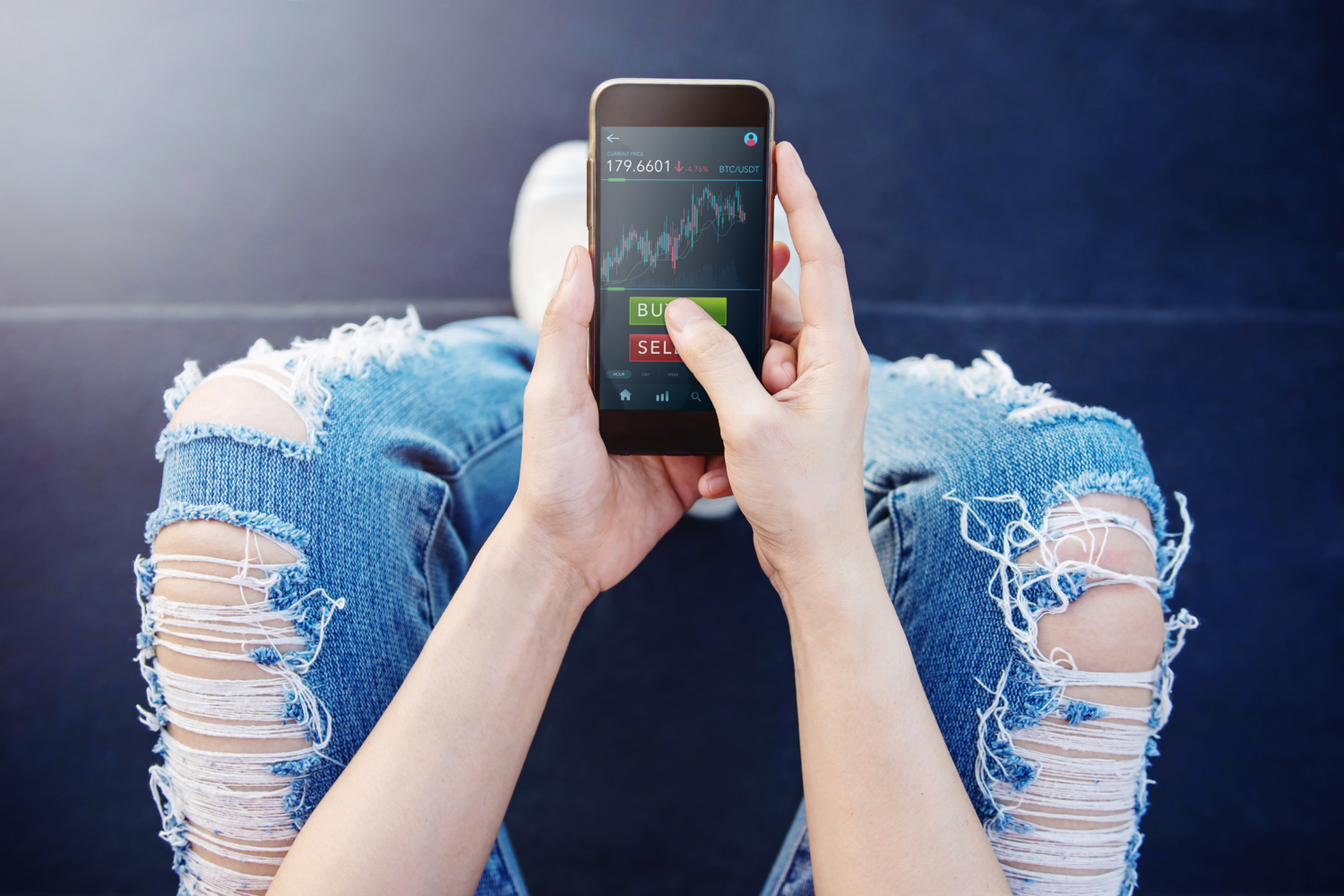 Aktienchart auf einem Handy-Display